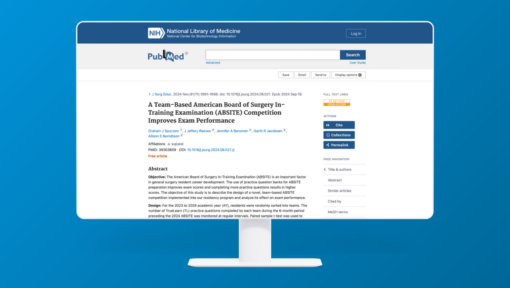 Screenshot of a PubMed article page displayed on a monitor, titled 'A Team-Based American Board of Surgery In-Training Examination (ABSITE) Competition Improves Exam Performance,' by Graham J. Spurzem and colleagues, showing the abstract's objective and design sections.